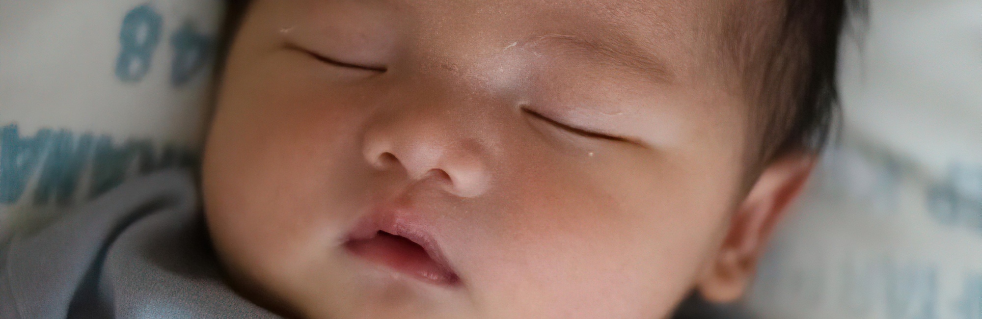 baby sleeping on back