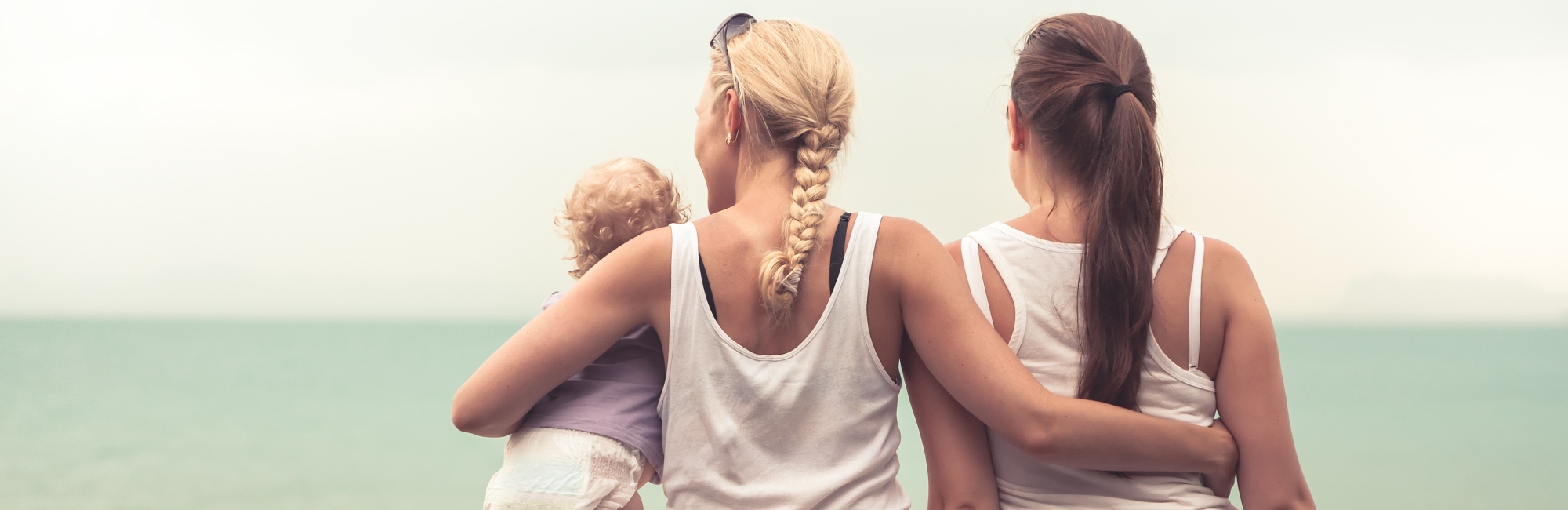 Lesbian parents with their baby