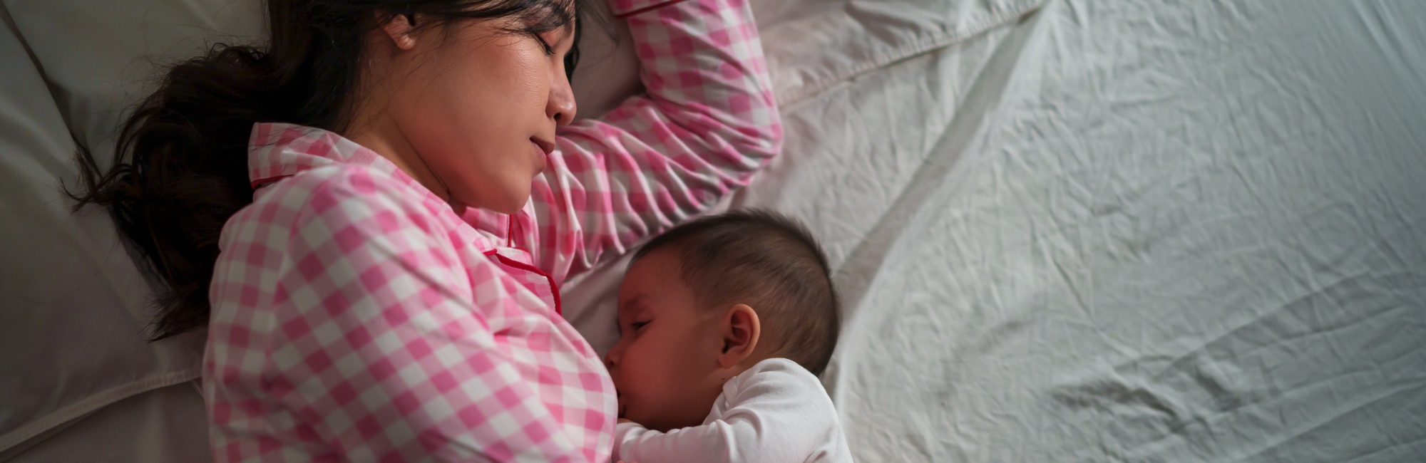 safe cosleeping with a breastfeeding or breast milk feeding baby